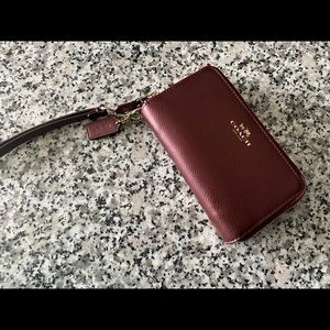 Coach metallic wine wristlet/wallet
